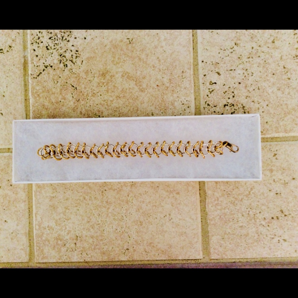 Gold and silver tone link bracelet